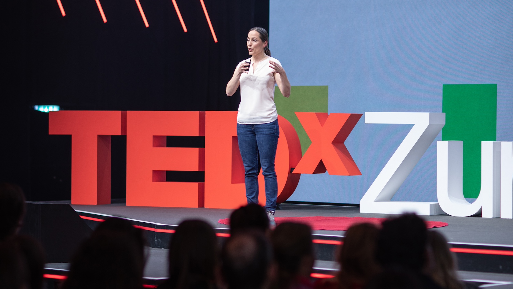 Sarah Ebling on stage of TEDxZurich 2023